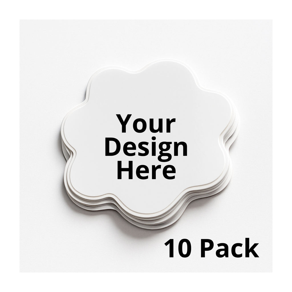 Stack of white coasters with 'Your Design Here' text and '10 Pack' label on a white background