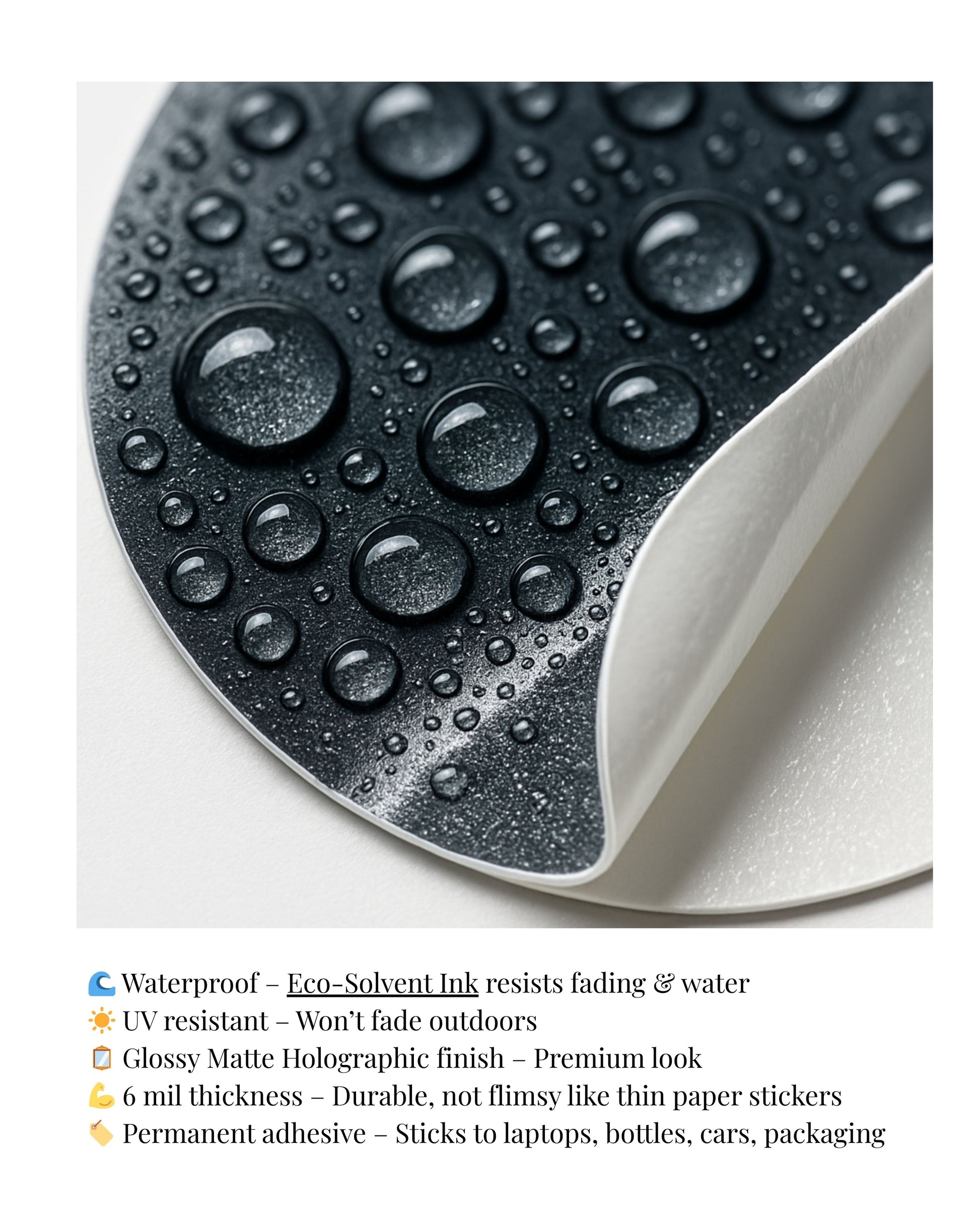Close-up of a textured black surface with water droplets and a white border.